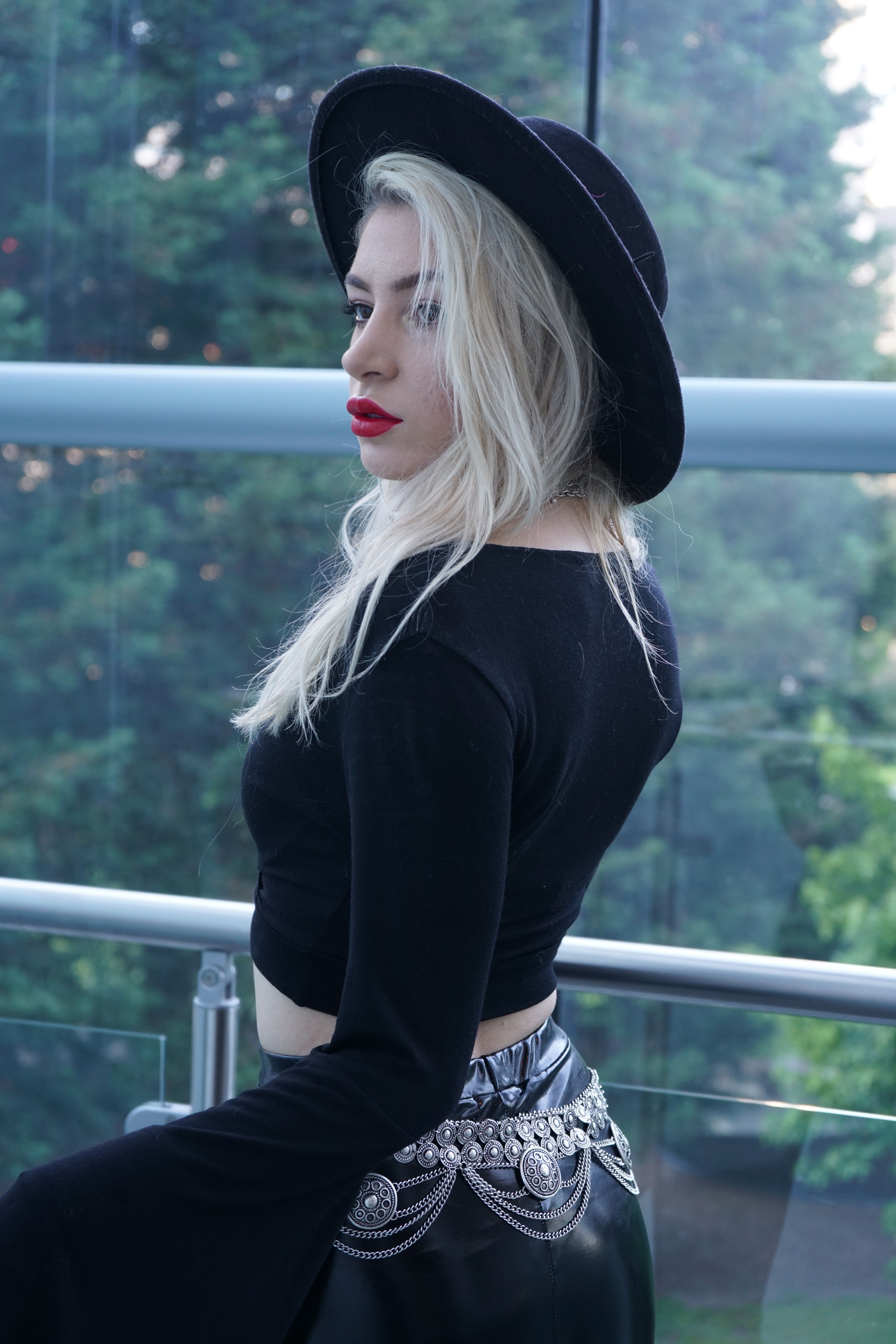 Blond Woman Wearing a Black Hat · Free Stock Photo
