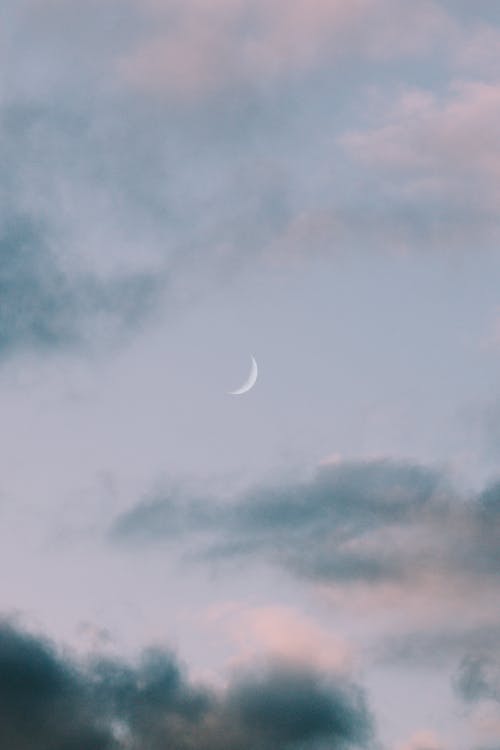 Free Cloudy blue sky with moon in evening Stock Photo