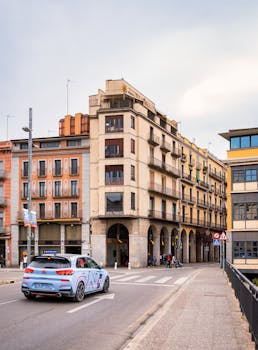 Explore the historic charm of Gerona's old town with classic architecture and bustling streets.