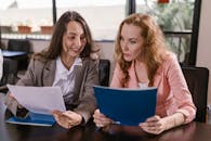 Colleagues looking at Documents