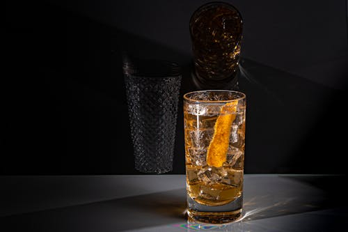 Alcohol in Glass on Grey Studio Background