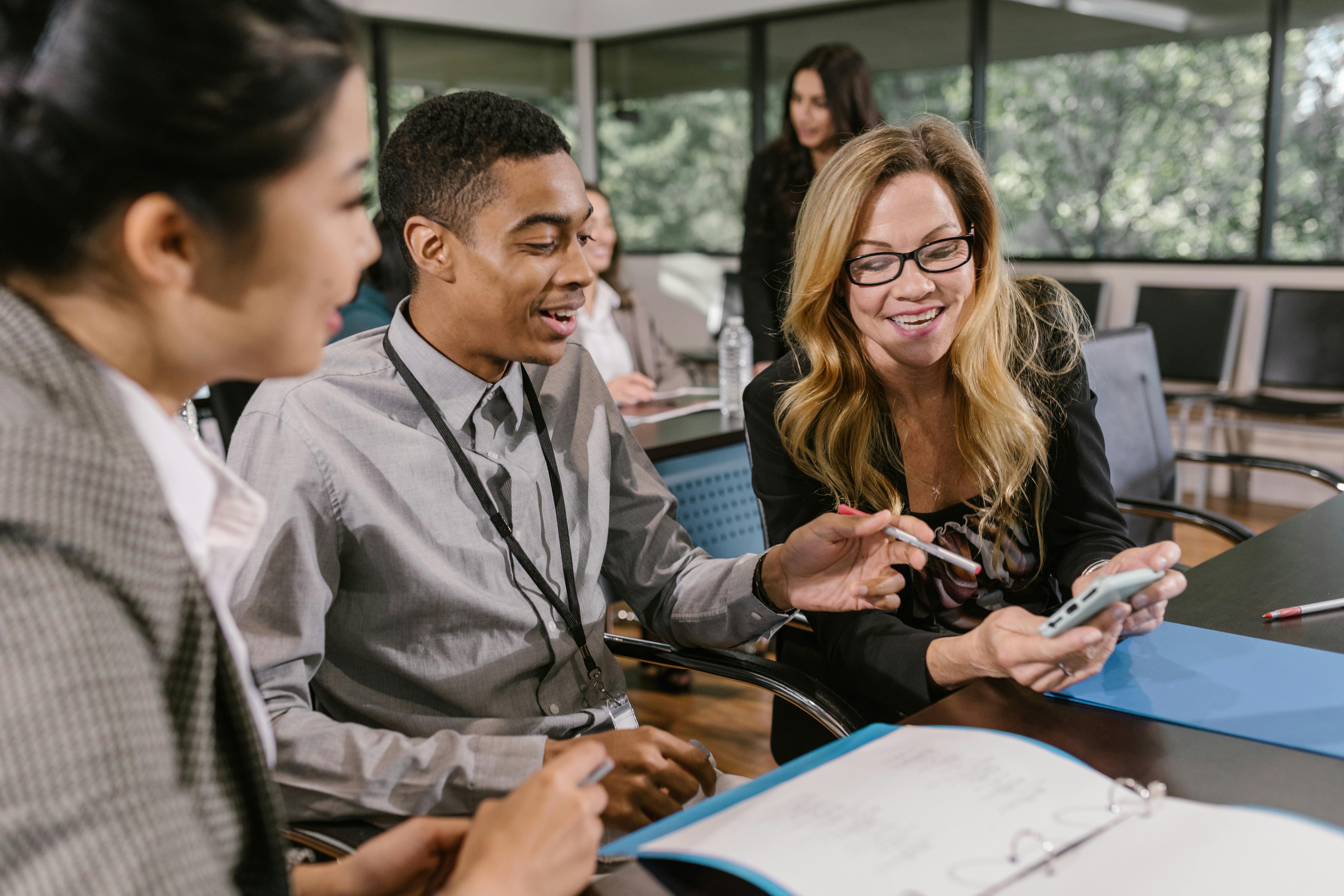 A team meeting in an office environment, potentially discussing ethical concerns or company responsibilities related to environmental practices.