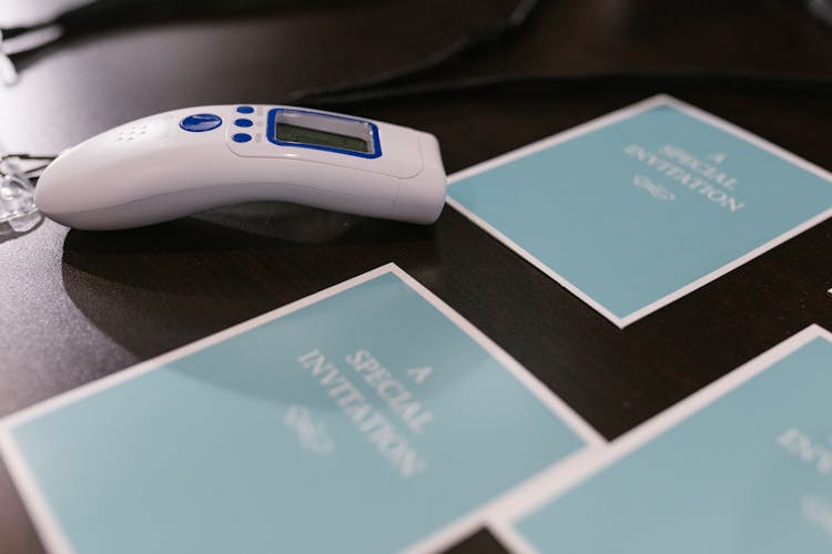 Infrared Thermometer On The Table