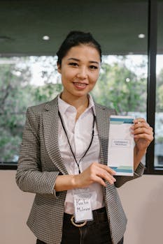 Confident businesswoman presenting a conference program indoors.