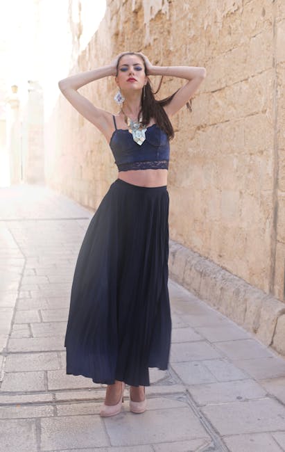 Photo of a Woman Wearing Black Dress