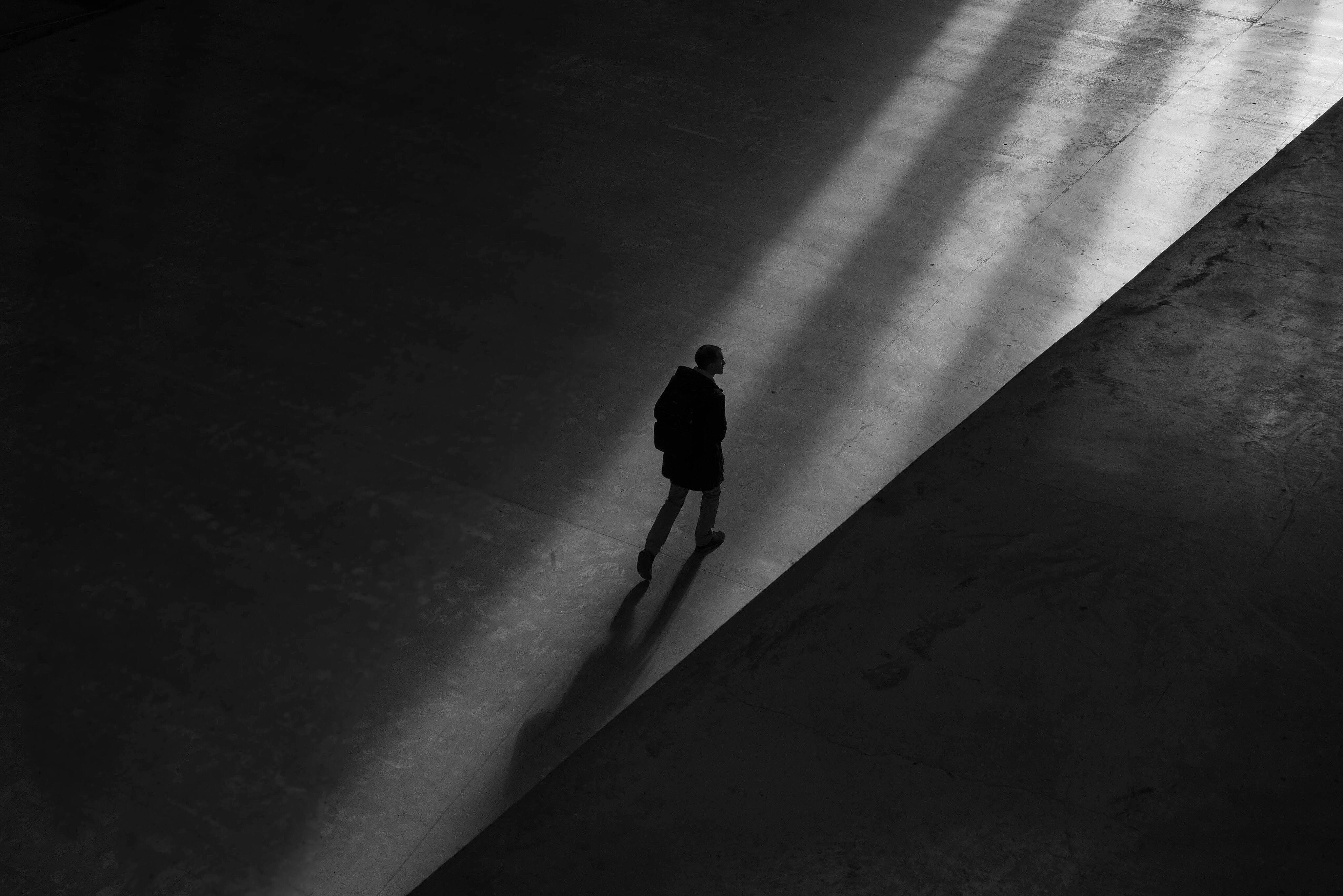 Premium Photo  A woman walking on a path in the sunset