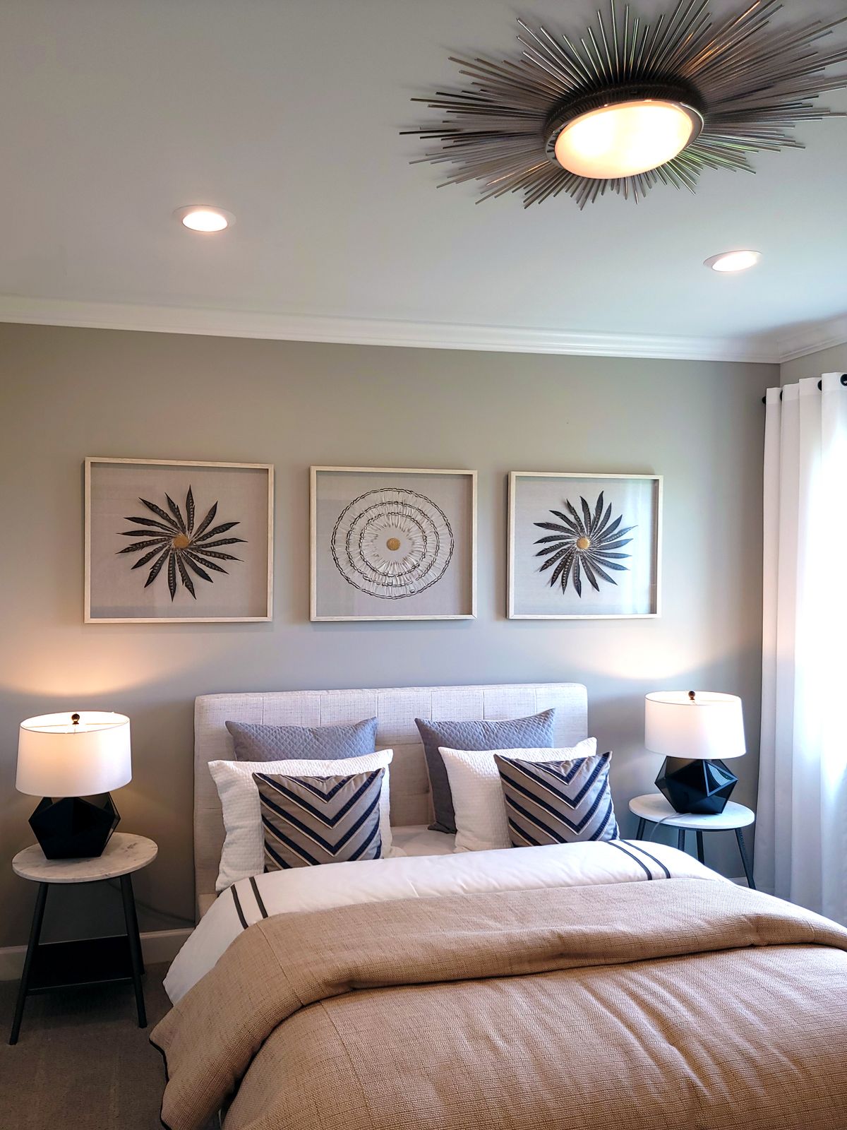 Urban bold interior with confident dark walls and framed art