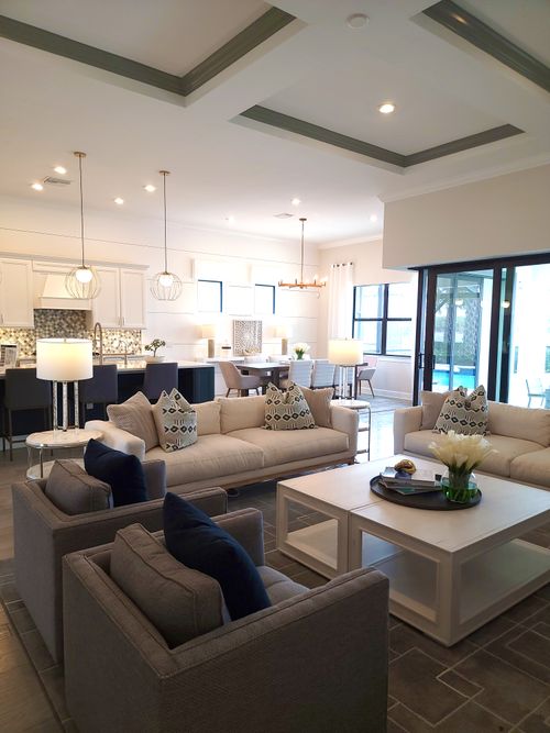 Free Elegant living room with chic decor and open layout for a luxurious feel. Stock Photo