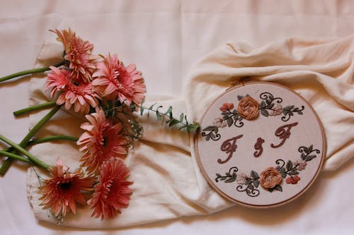 Free Floral Design on White Textile Stock Photo