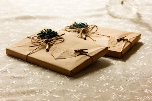 Presents Wrapped in Brown Paper with Heart Shape Cards