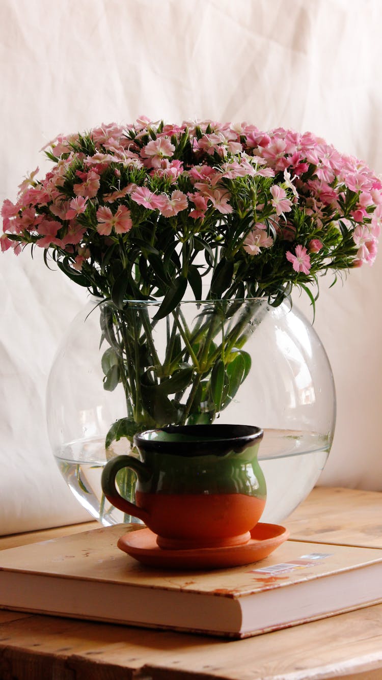 Pink Flowers In A Fishbowl