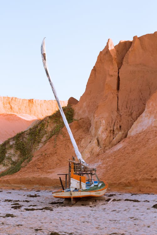 Abandoned Sailboat on Shore