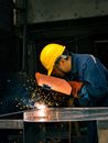 Man in Blue Dress Shirt Wearing Yellow Hard Hat