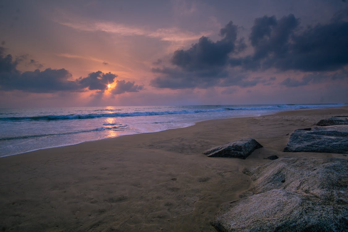 Безкоштовне стокове фото на тему «берег, Захід сонця, зіткнення»