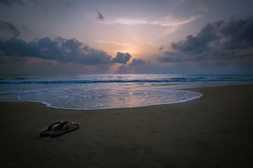 Foto profissional grátis de areia, atraente, calçados