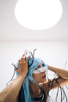 A futuristic woman with blue hair and metallic elements in a cyberpunk style.