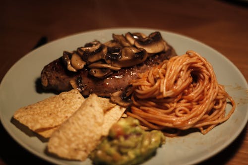 Free Steak With Mushroom And Spaghetti  Stock Photo