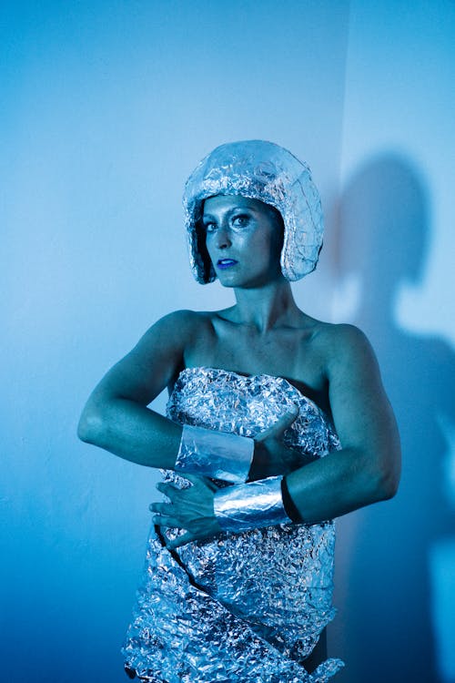 A Woman in a Futuristic Dress Posing