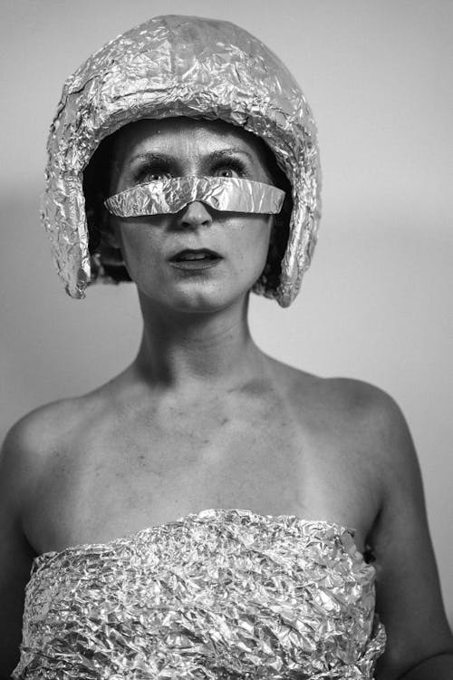 Grayscale Photo of a Woman in a Futuristic Dress