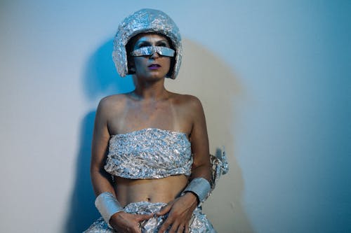 A Woman in a Futuristic Dress Posing