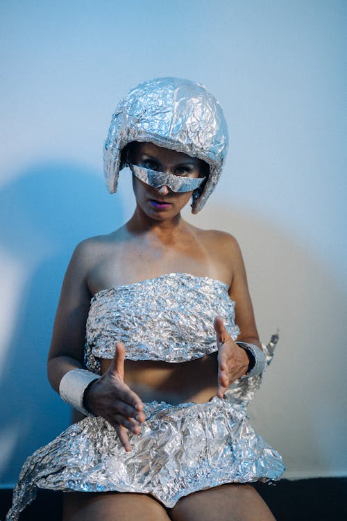 A Woman in a Futuristic Dress Posing