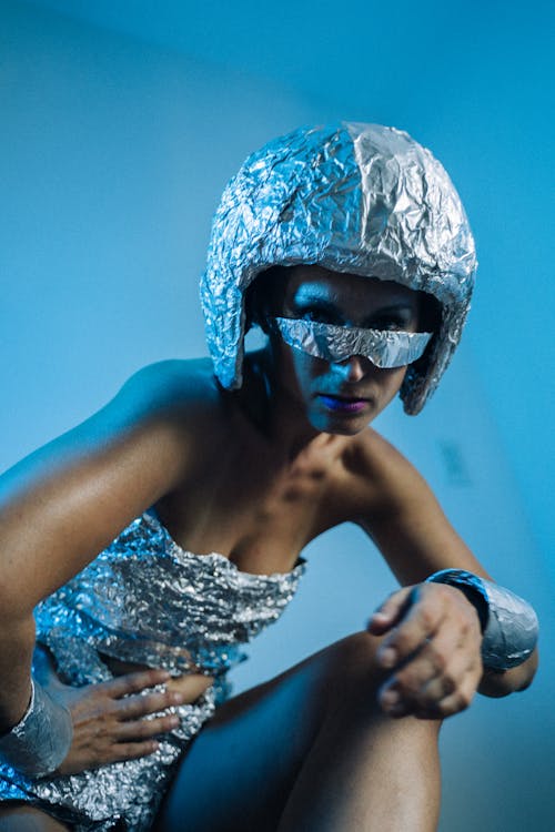 A Woman in a Futuristic Dress Posing