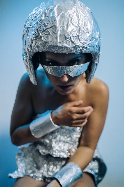 A Woman in a Futuristic Dress Posing