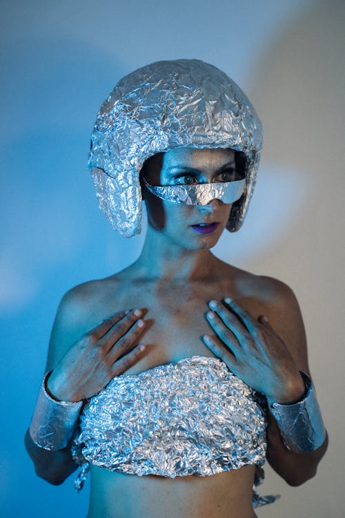 A Woman in a Futuristic Dress Posing