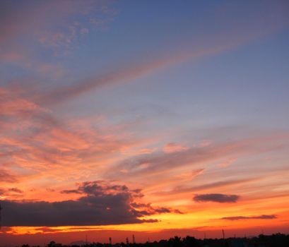 A stunning sunset with vivid colors and dramatic cloud formations.