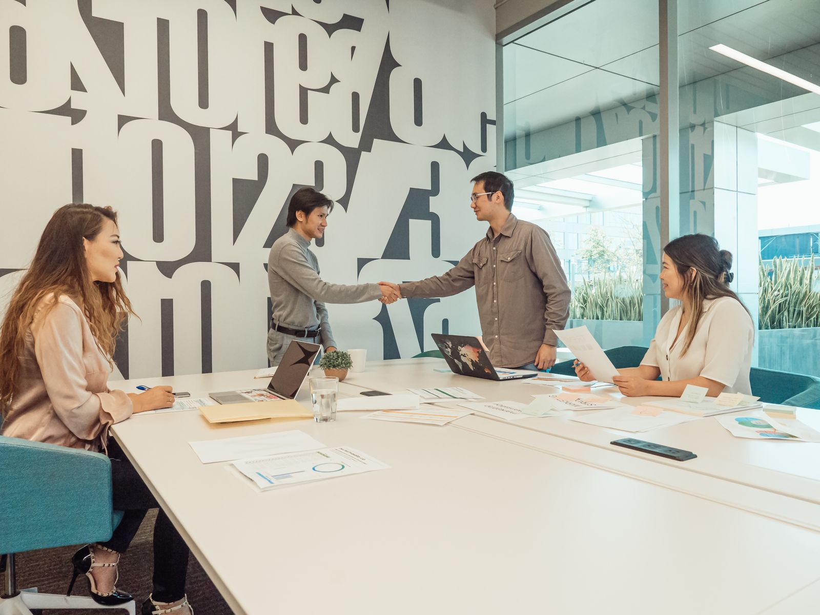 Professionals collaborating in a modern office