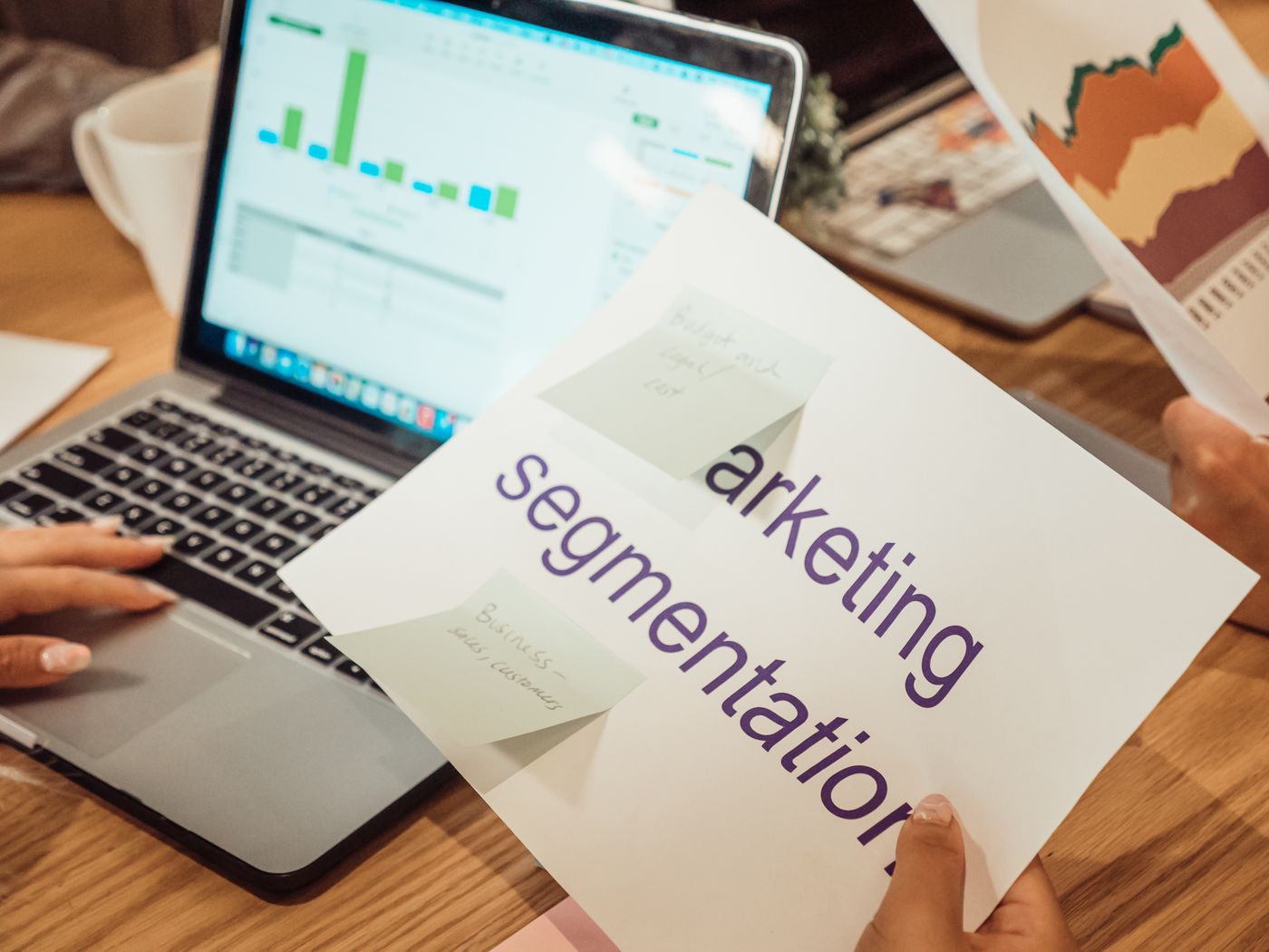 Digital marketing team reviewing campaign performance and analytics