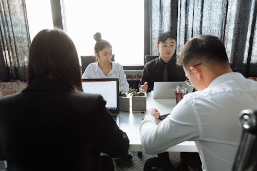 People Having a Meeting at the Office