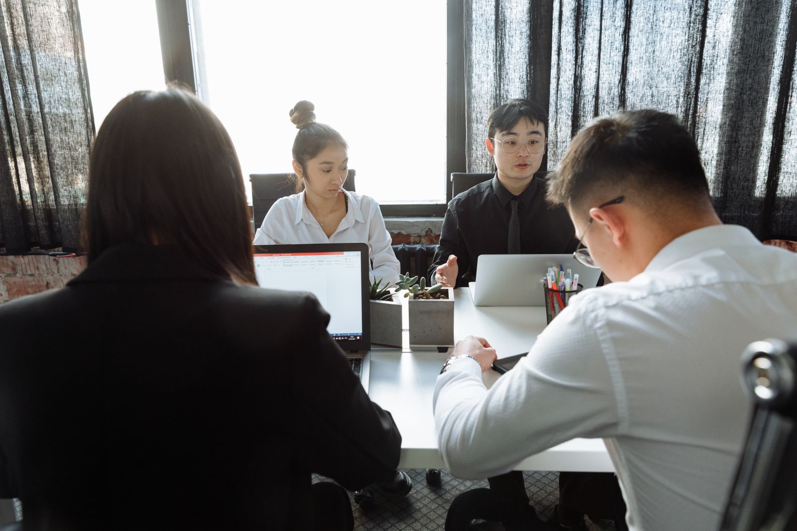 Professional marketing team collaborating in an office