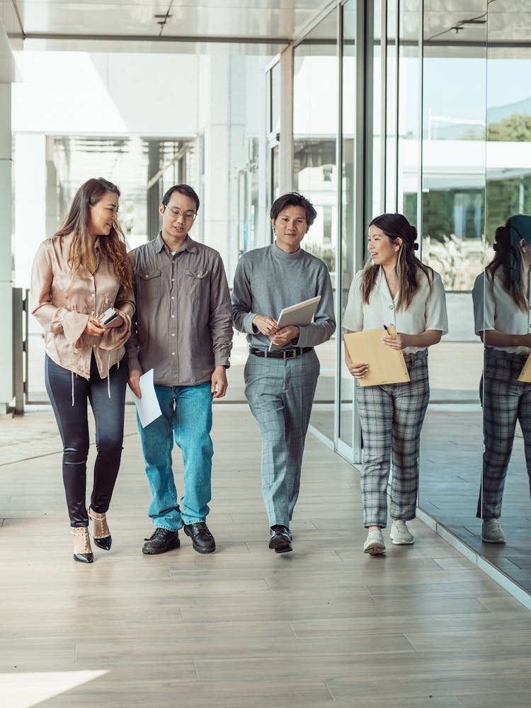 People Talking While Walking Outside