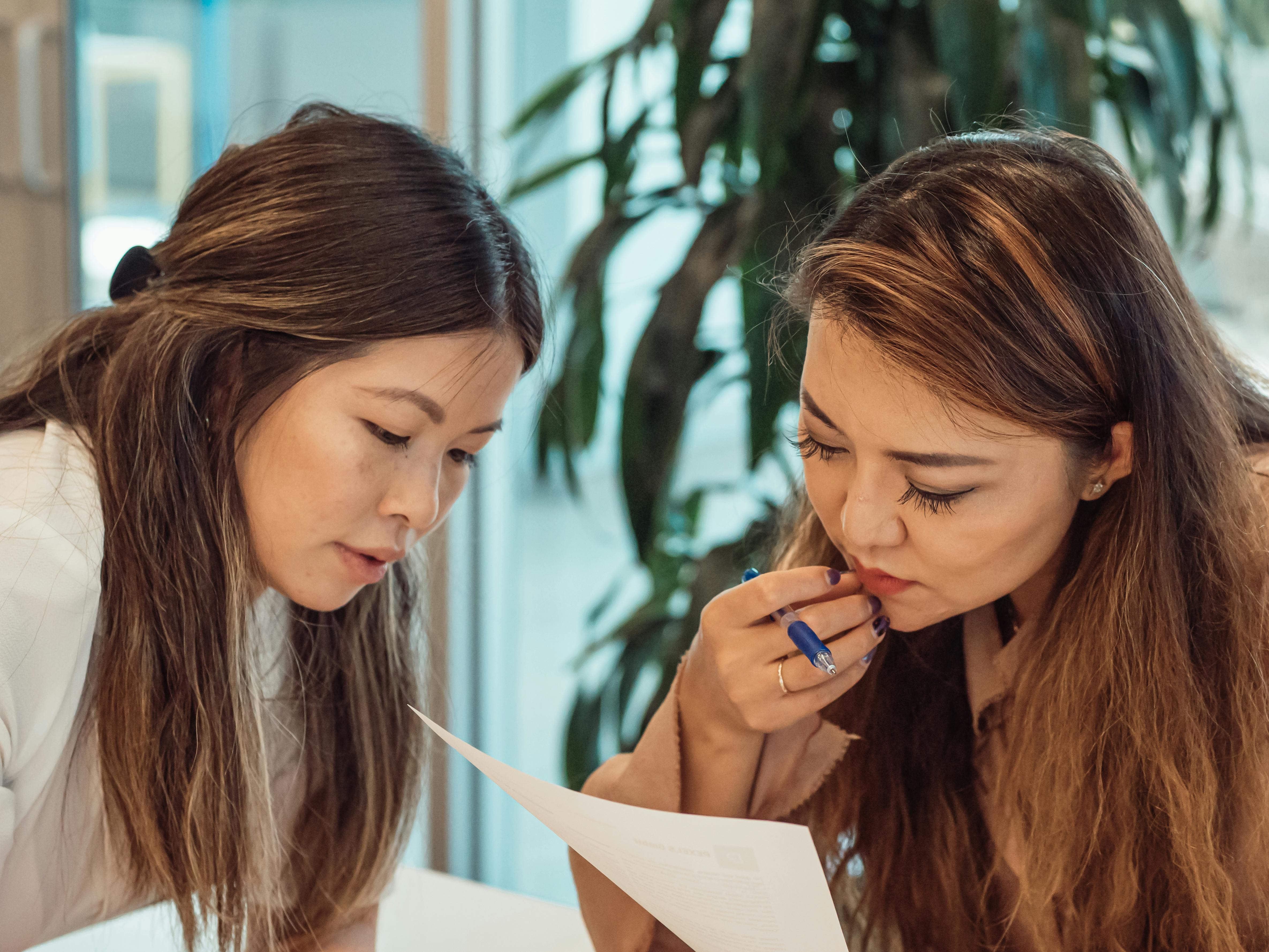 two women having a meeting in the office