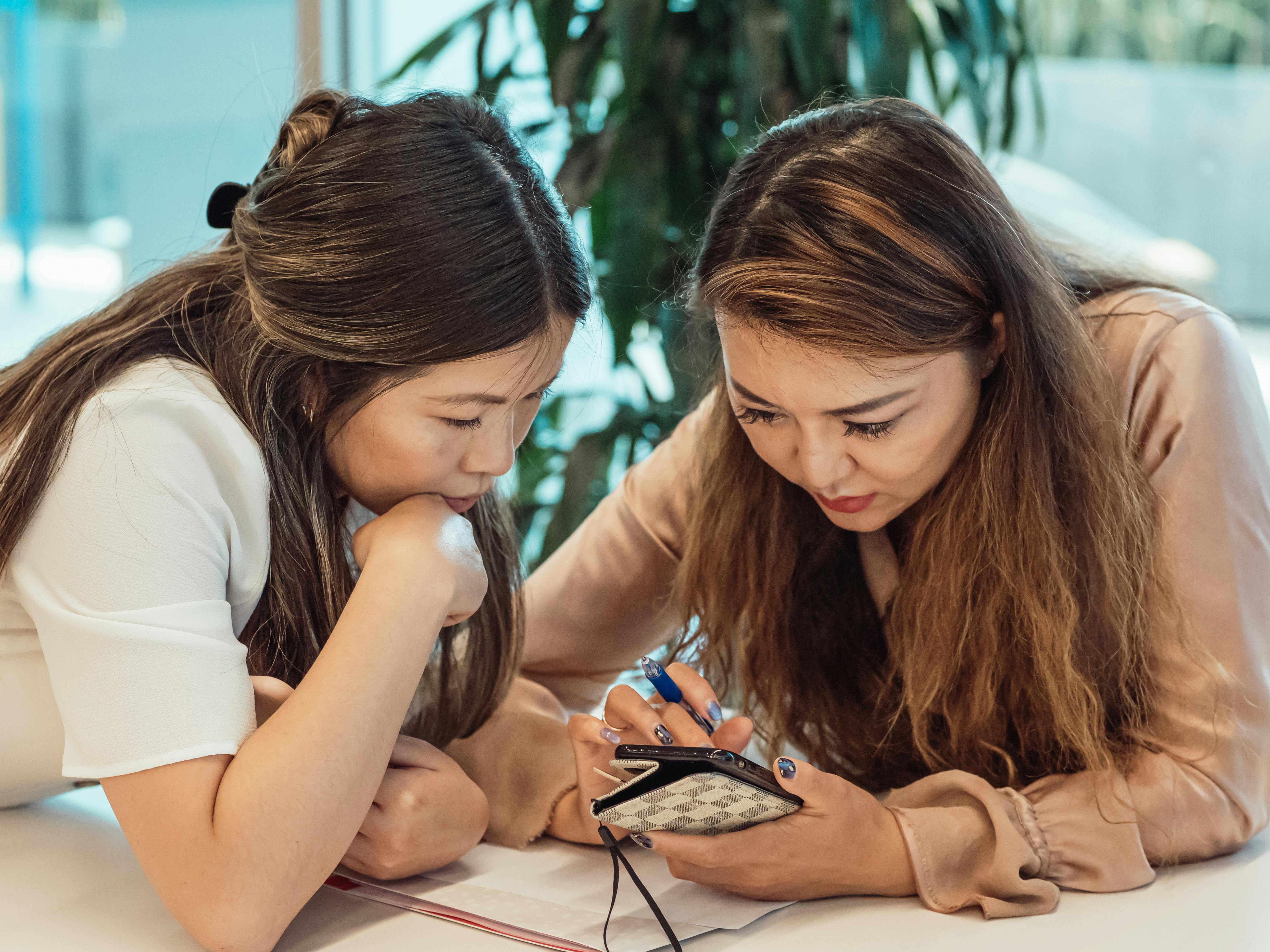 two women having a meeting in the office