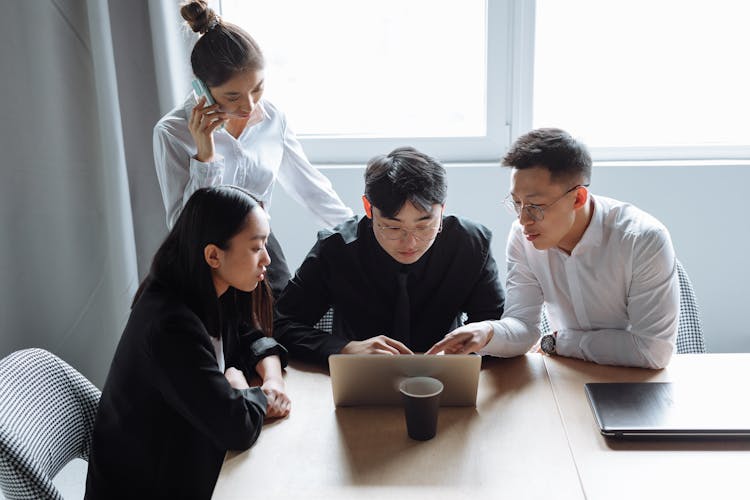 People Working Together At The Office