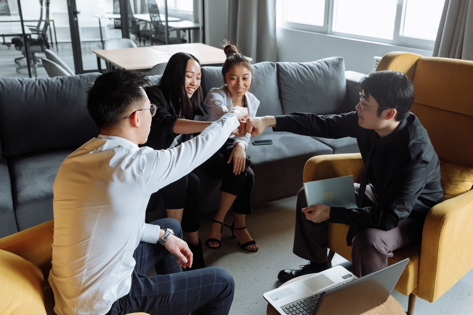 A Group of People Having a Meeting in the Office