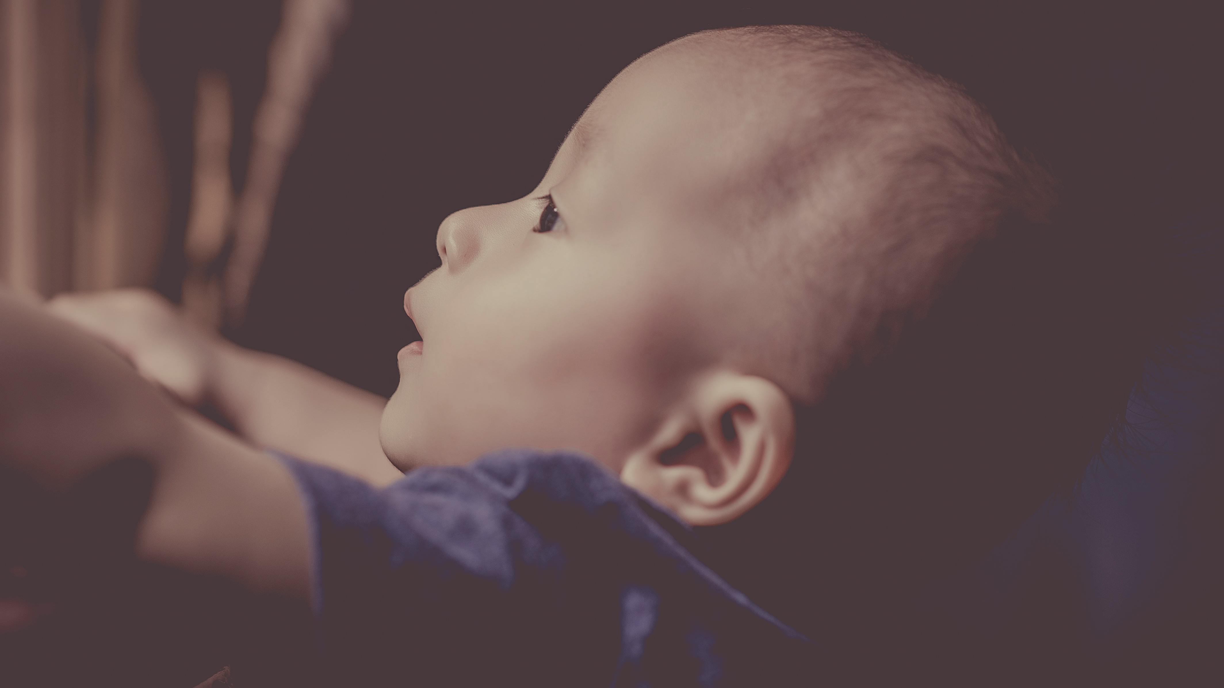 Baby Looking Upwards · Free Stock Photo