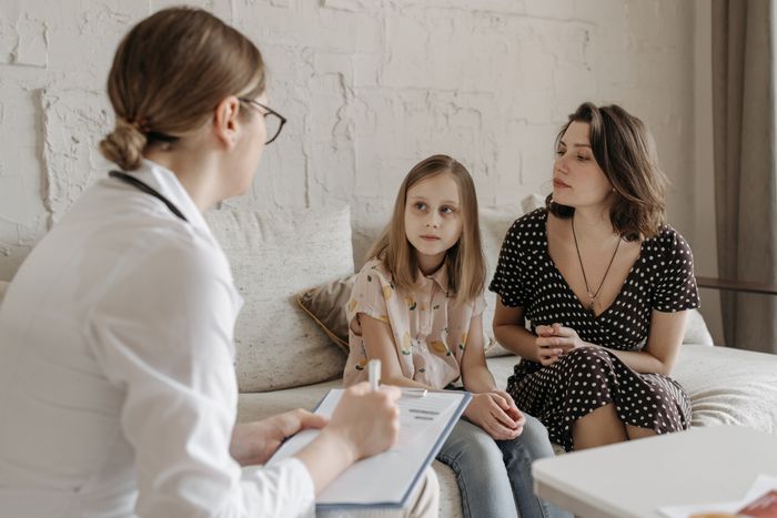 Clinician discussing a home care assessment with a family