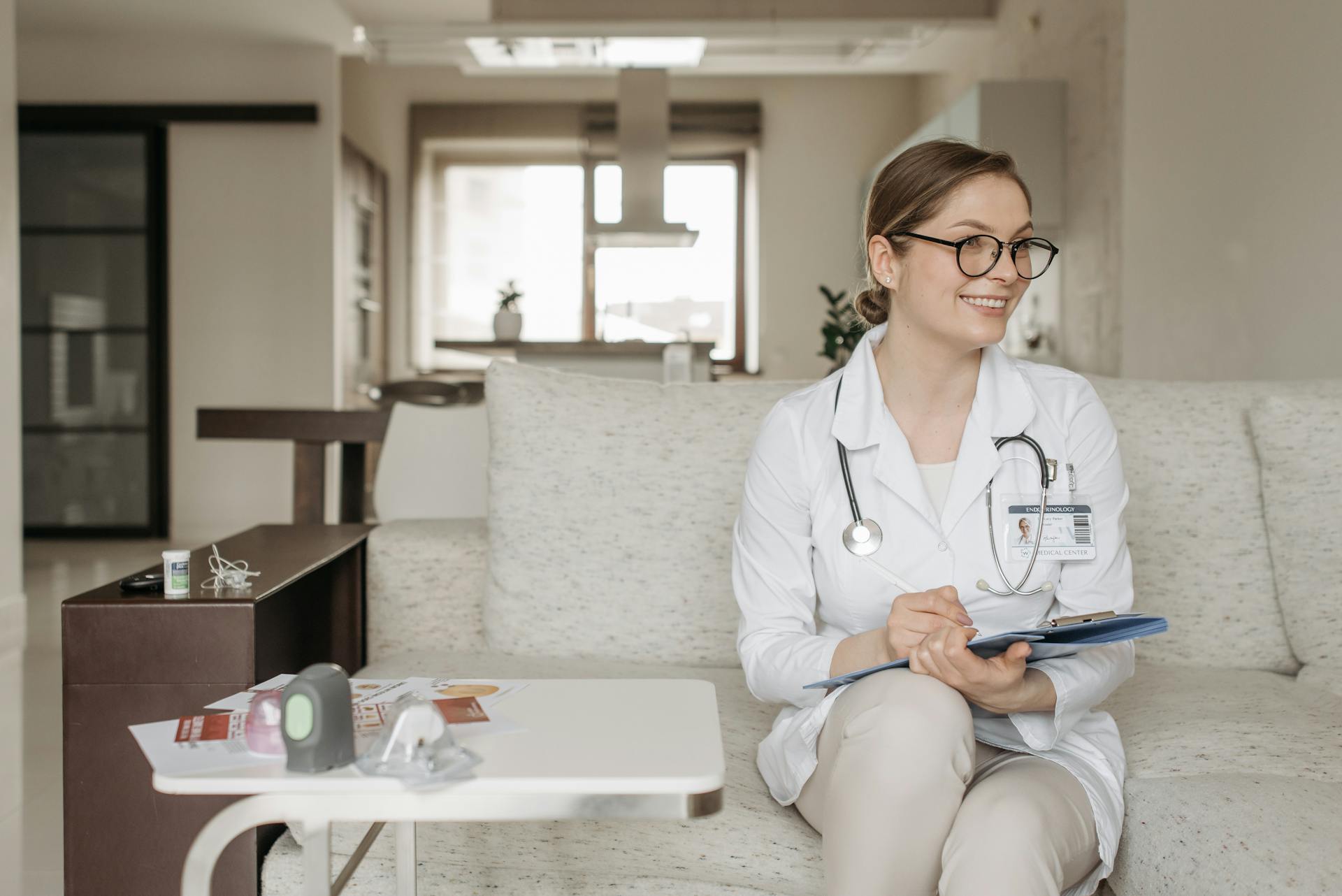 A Medical Professional Sitting on a Sofa