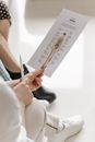 Person Holding White Printer Paper