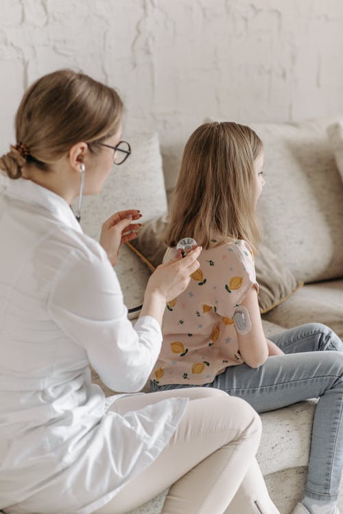 A Doctor Checking a Child