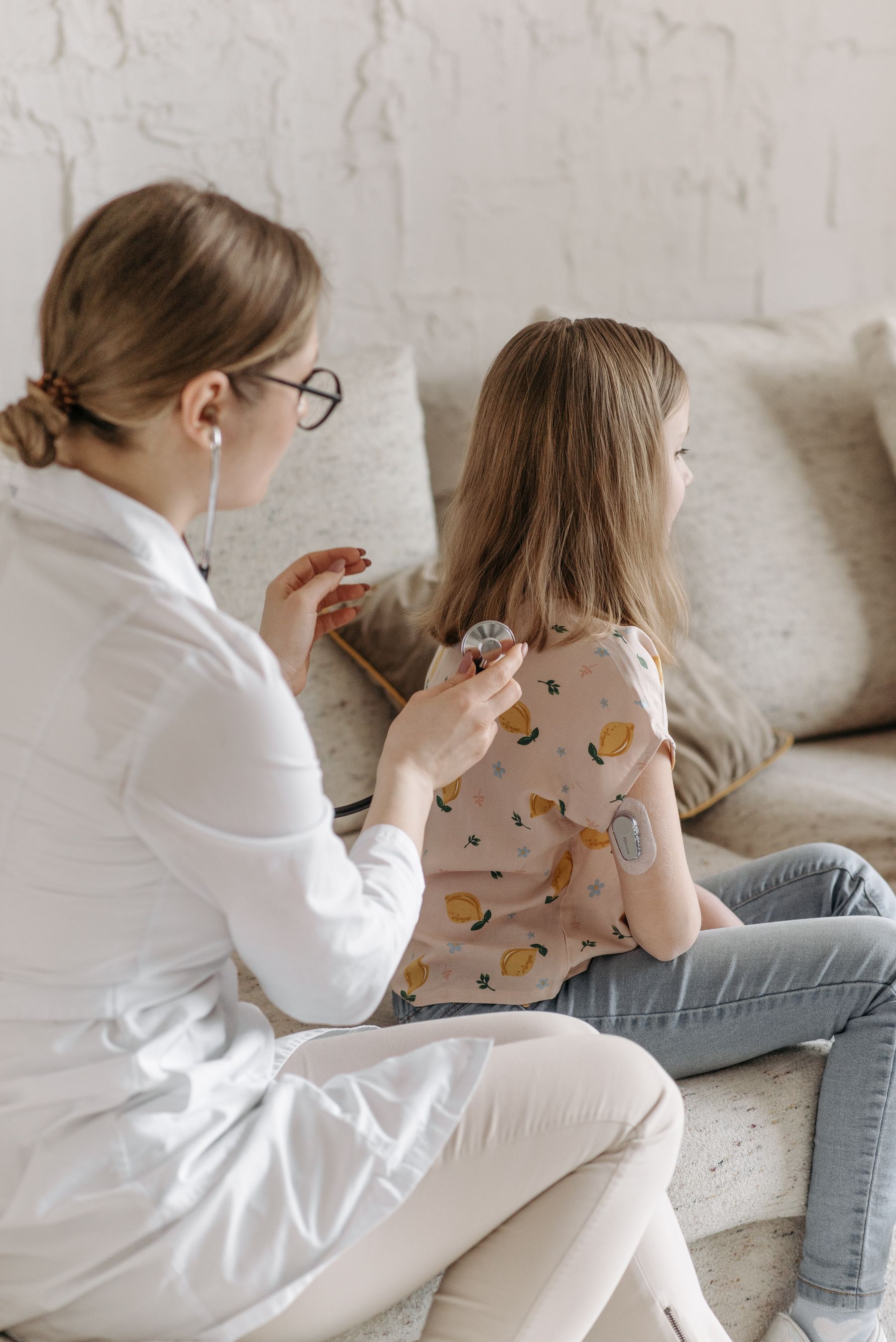Provider explaining the next care step during a calm appointment