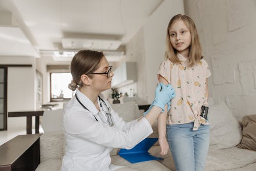 A Doctor Checking a Child