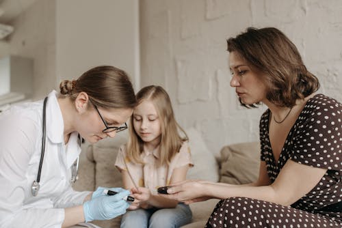 A Doctor Checking a Child