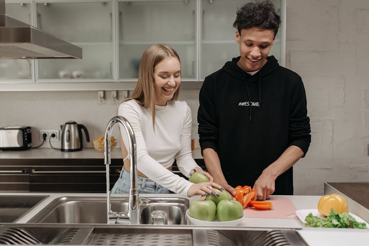 A Couple Cooking Together