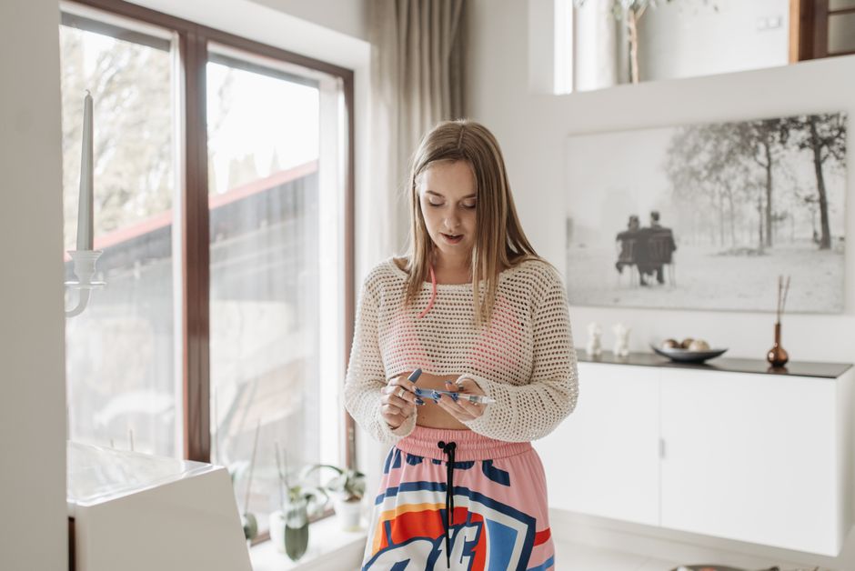 Photo by Pavel Danilyuk on Pexels Person preparing a weekly GLP-1 injection at a kitchen counter