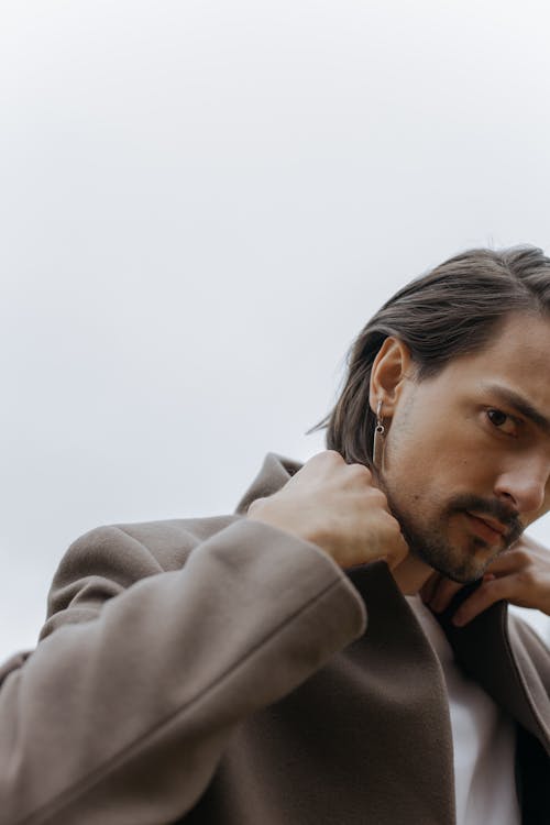 Close-Up Shot of a Man in Gray Blazer
