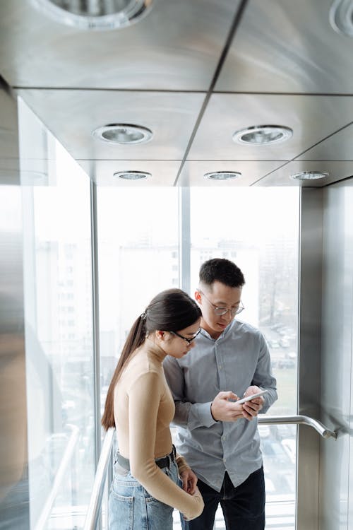 Man and Woman Inside the Elevator